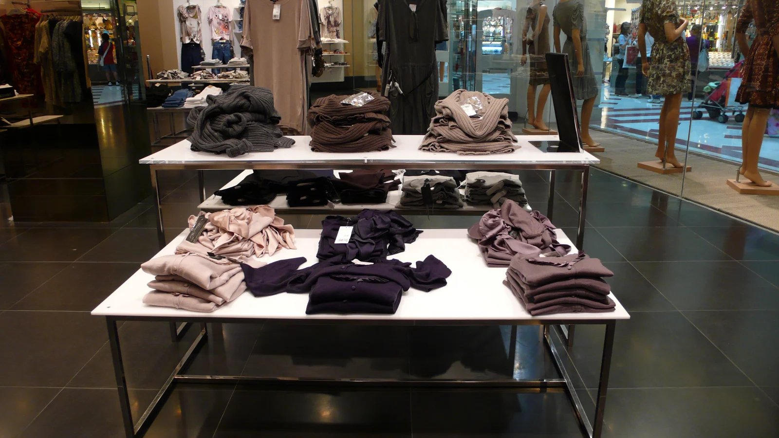 Retail display table with folded garments